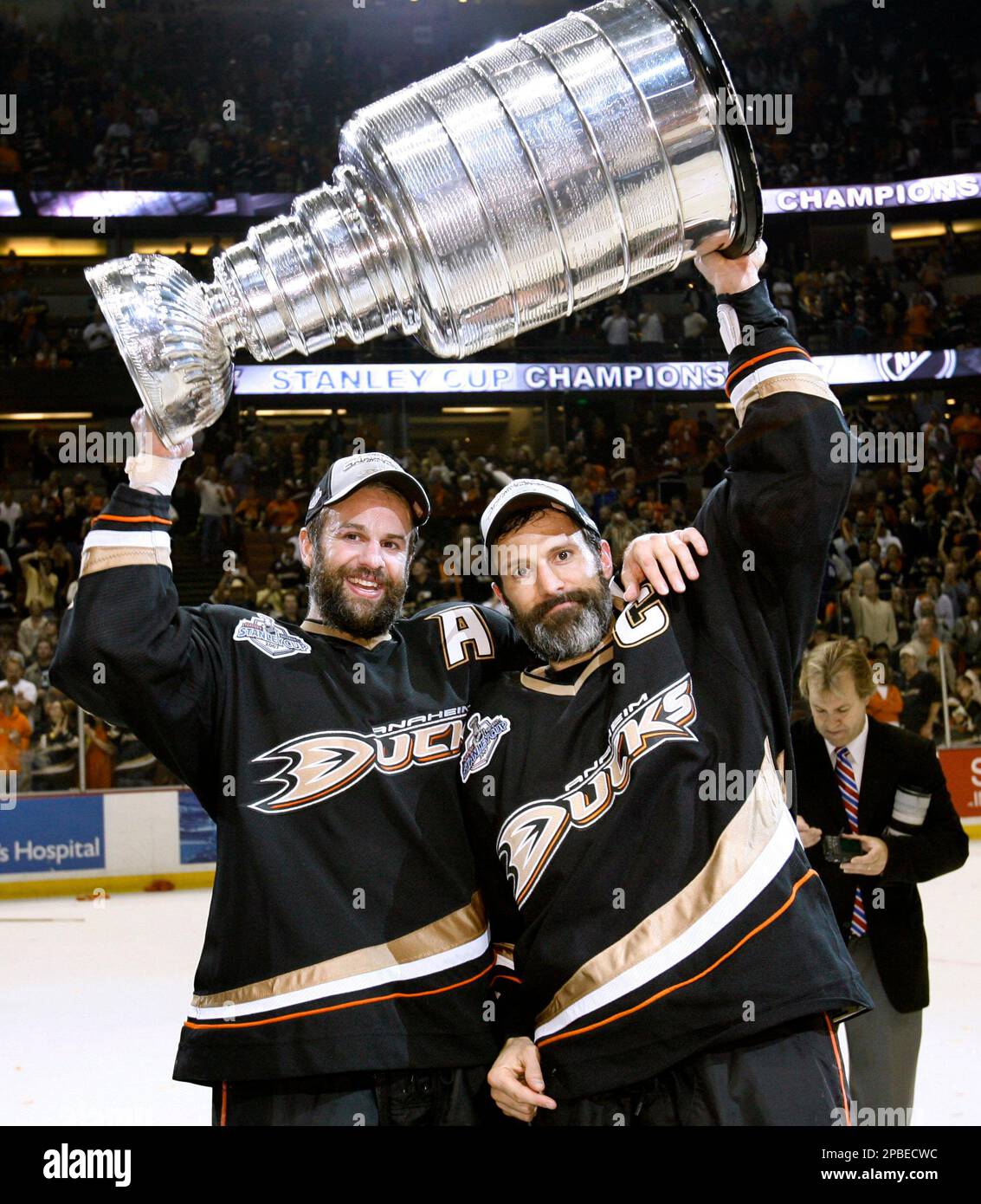 Anaheim Ducks captain Scott Niedermayer, right, and his brother Rob  Niedermayer hold up the Stanley Cup after the Ducks won the finals with a  6-2 victory over the Ottawa Senators in Anaheim,