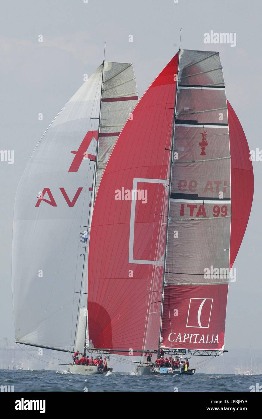 The French Areva Challenge yacht, left, and the Italian Mascalzone Latino-Capitalia, right, are seen sailing to the windward mark during the second round-robin stage of the Louis Vuitton Cup off the coast of Valencia, Spain, Monday April 30, 2007. (AP Photo/Fernando Bustamante) Banque D'Images