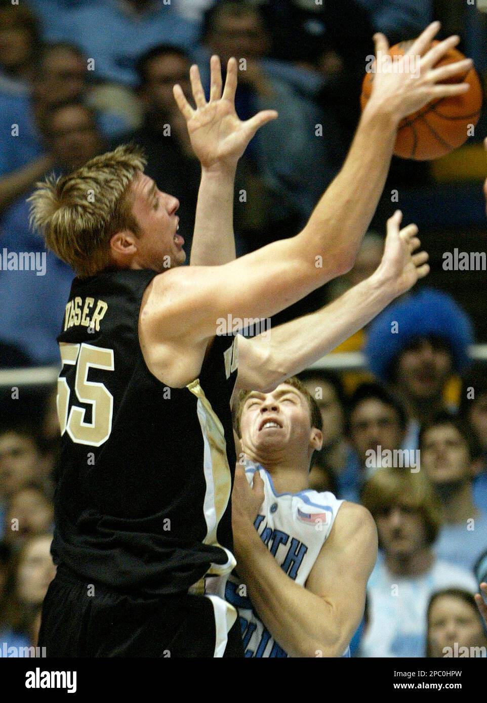 Wake Forest's Kyle Visser (55) and North Carolina's Tyler Hansbrough