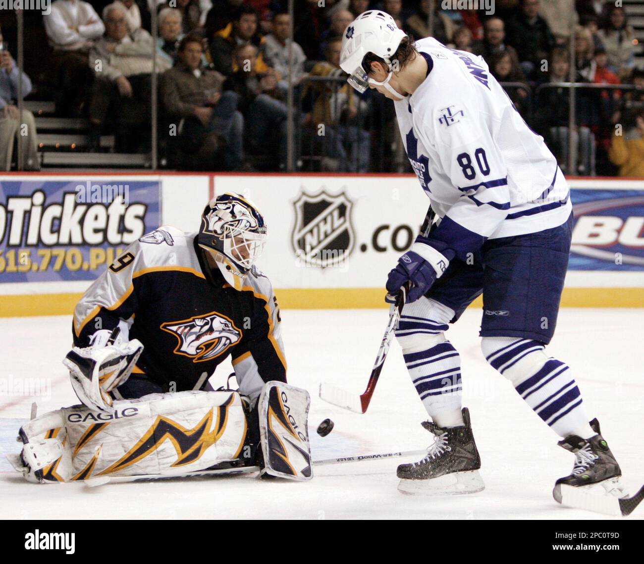 Nashville Predators goalie Tomas Vokoun, left, of the Czech Republic, blocks a shot by Toronto Maple Leafs center Nik Antropov, of Kazakhstan, in the second period of an NHL hockey game in Nashville, Tenn., Thursday, Feb. 8, 2007. (AP Photo/Mark Humphrey) Banque D'Images