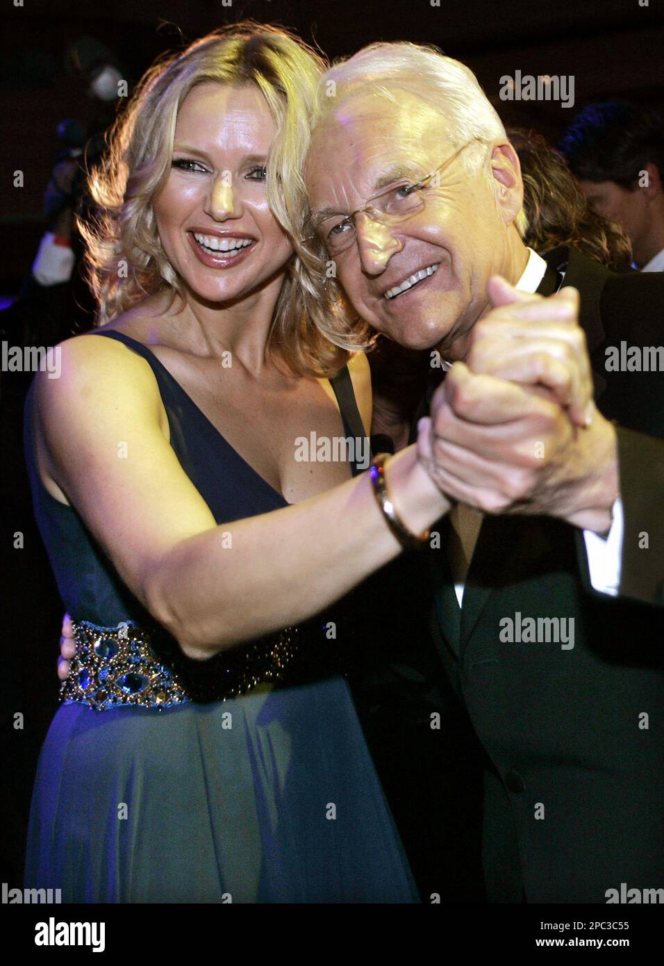 Bavarian state governor Edmund Stoiber dances with actress Veronica