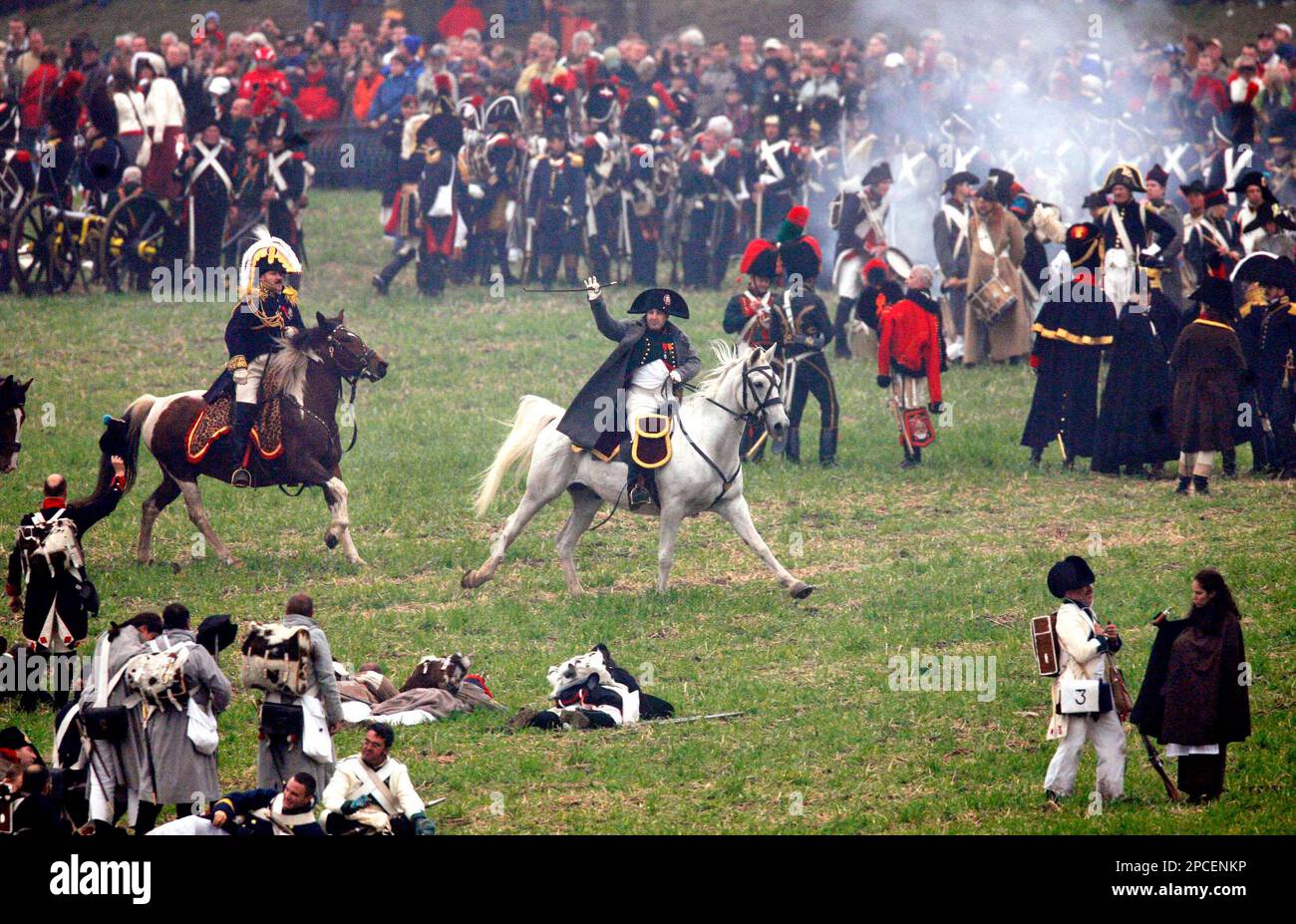 Marc Schneider from Williamsburg, Virginia, USA, center, celebrates his