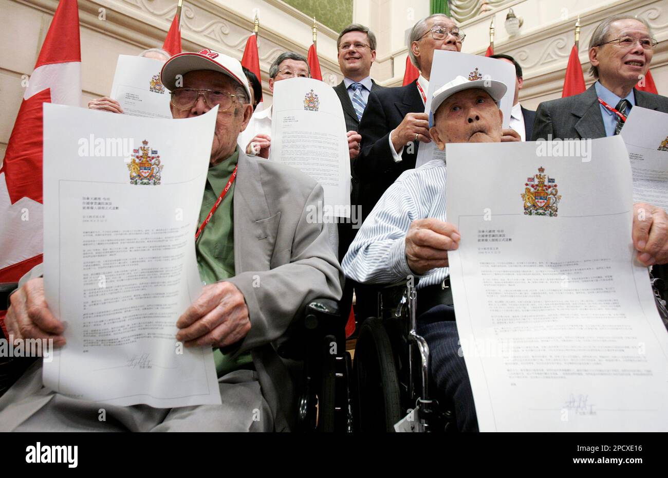 Canadian Prime Minister Stephen Harper poses for a photo with Canadian ...