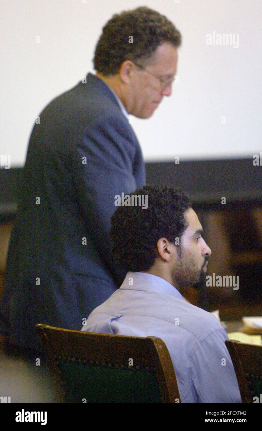 Defendant Esteban Carpio sits in court next to his attorney, Robert L ...
