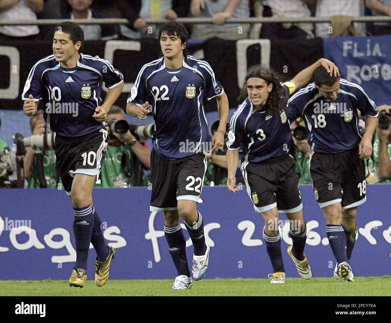 From left, Argentina's Juan Roman Riquelme, Lucho Gonzalez, and Juan Pablo  Sorin celebrate with teammate Maxi Rodriguez after he scored during the  Germany 2006 Soccer World Cup, Group C, soccer match between