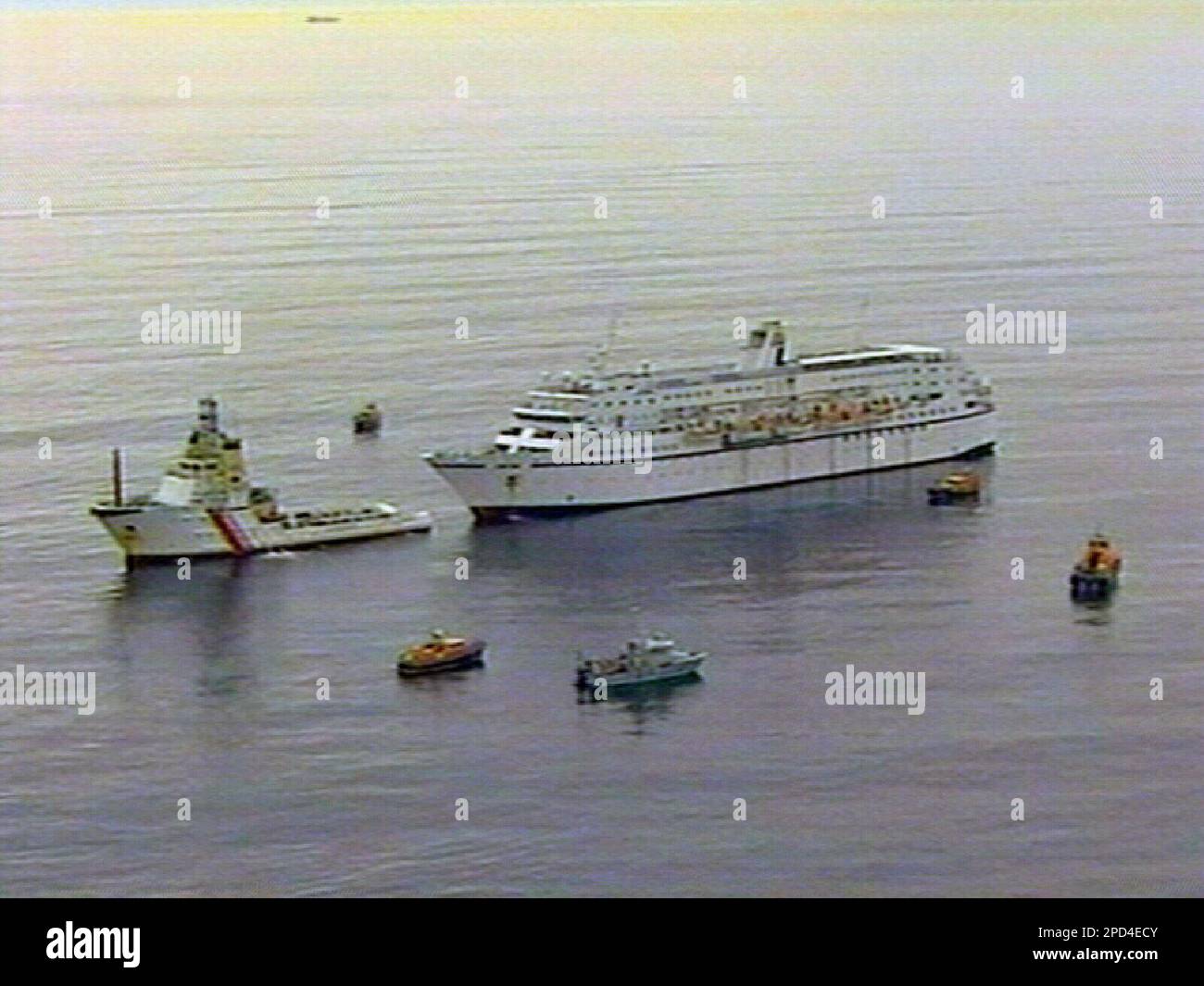 This image from video shows the cruise ship Calypso with 708 people on board under tow to port after an engine fire left it drifting in the English Channel on Saturday morning May 6, 2006. There were no casualties and it was not necessary to evacuate the ship. (AP Photo/tel) Banque D'Images