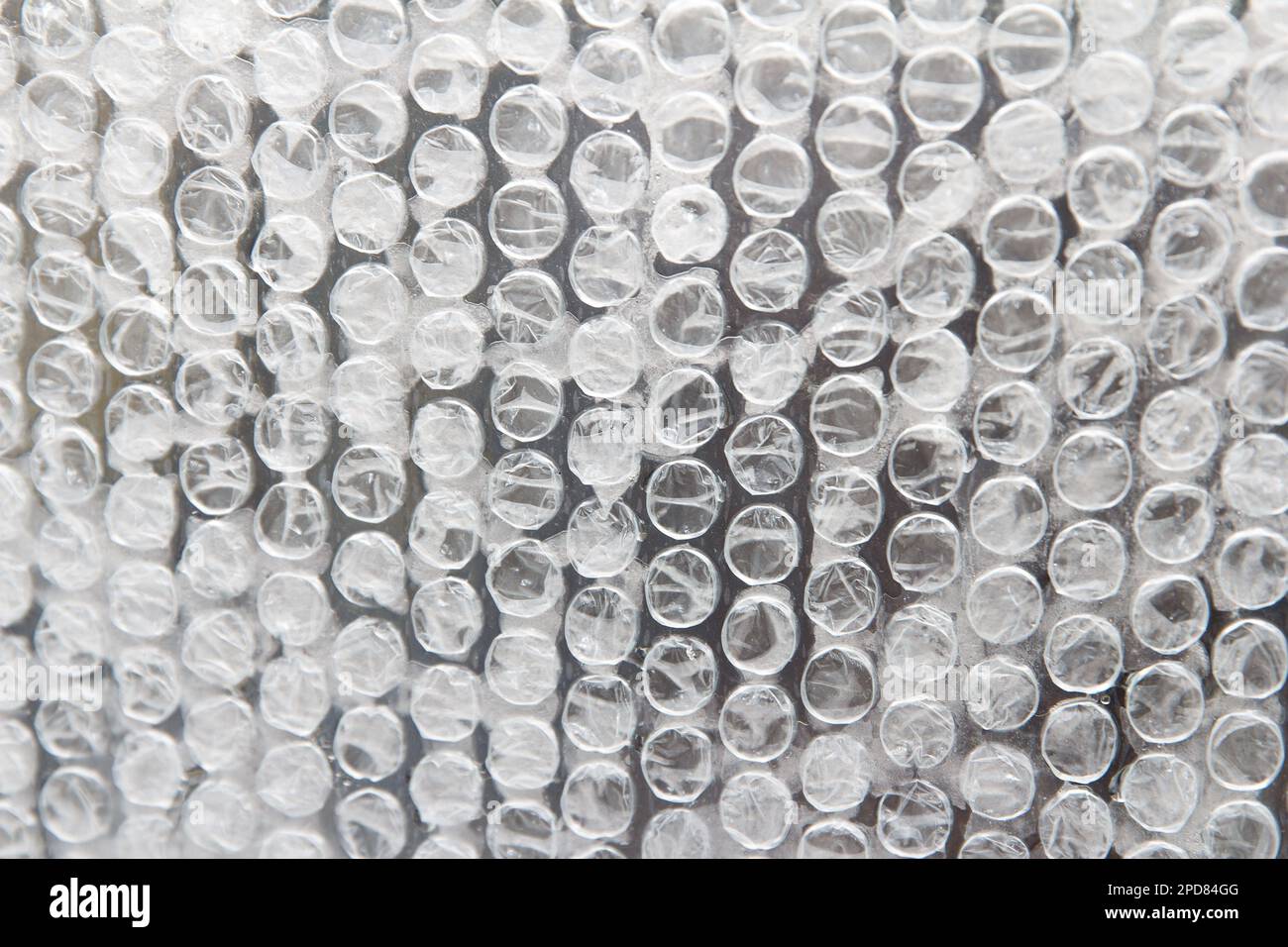 L'emballage à bulles d'eau en cellophane protège le produit contre les dommages et l'humidité, est une excellente protection lors de la livraison de marchandises. Arrière-plan Banque D'Images