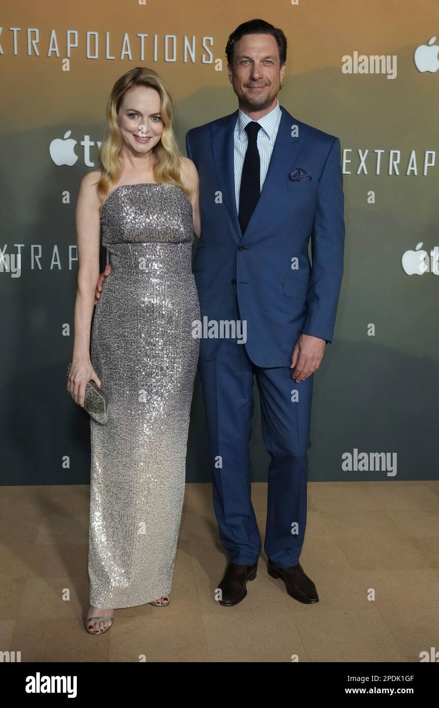 Heather Graham, left, and John de Neufville arrive at the Los Angeles