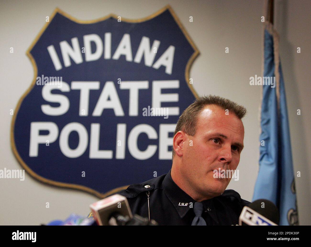 Indiana State Police Trooper David Cox talks with reporters Monday, Nov