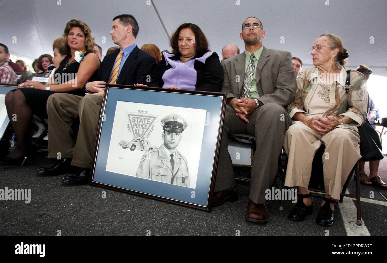 From left, Lisa Scales, widow of New Jersey State Police Trooper