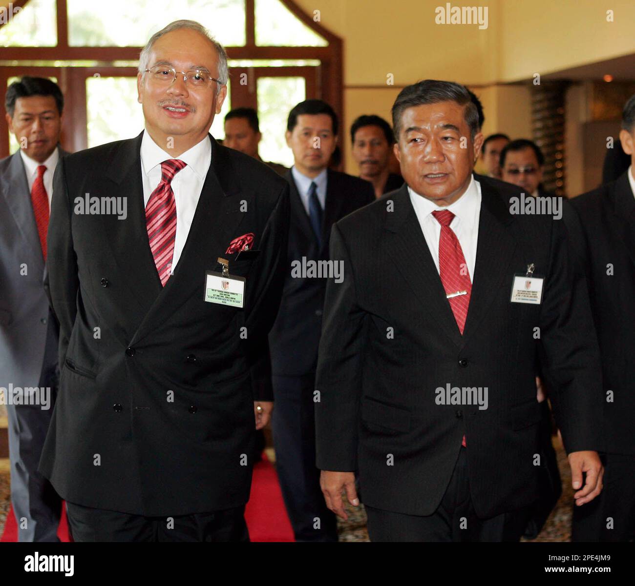 Thai Defense Minister Thammarak Isarangura Na Ayutthaya, right, walks ...