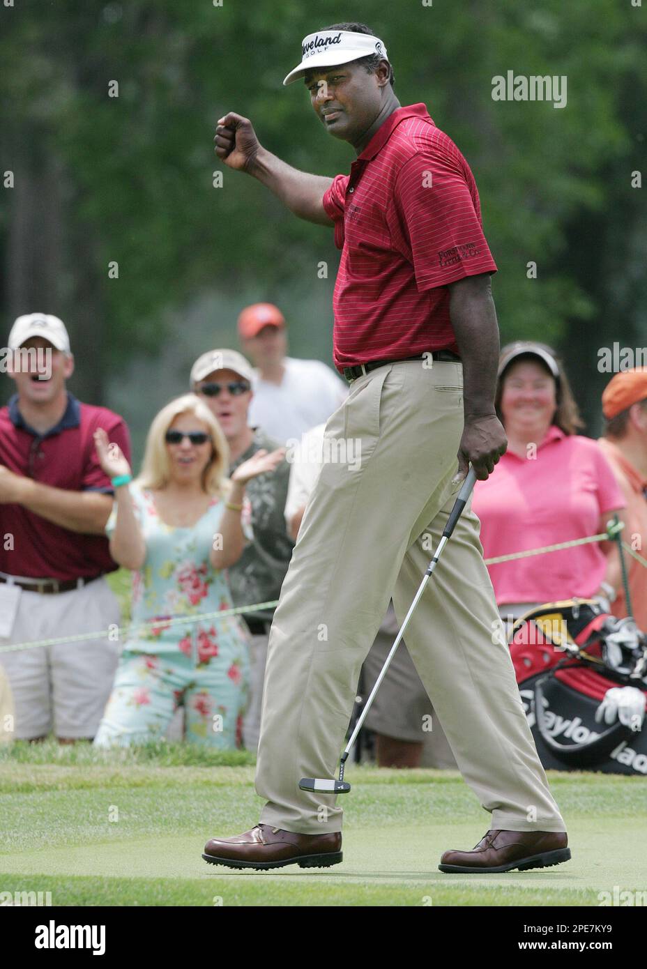 Defending tournament champion Vijay Singh reacts after sinking a birdie putt of more than 70 feet on the fourth hole during the second round of the Houston Open, Friday, April 22, 2005, in Humble, Texas. (AP Photo/David J. Phillip) Banque D'Images