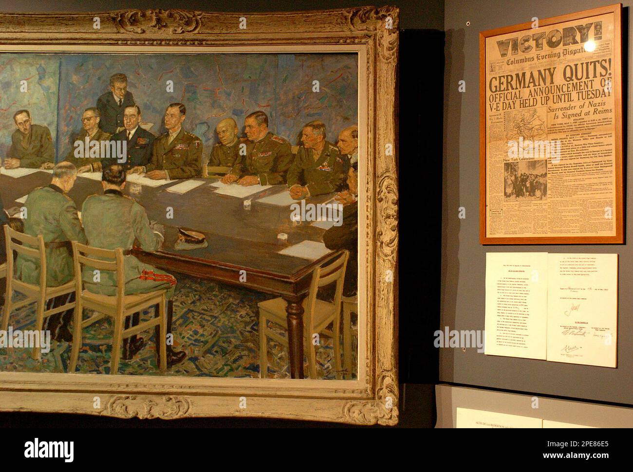 A painting representing the signature of the German surrender to Allied Forces and photographs cover a wall of a windowless room of a schoolhouse in Reims, northeastern France, bearing witness to the spot where World War II ended in Europe, April 14, 2005. As Europe prepares to mark the milestone, it is till writing the epilogue. (AP Photo/Philippe Gisselbrecht) Banque D'Images