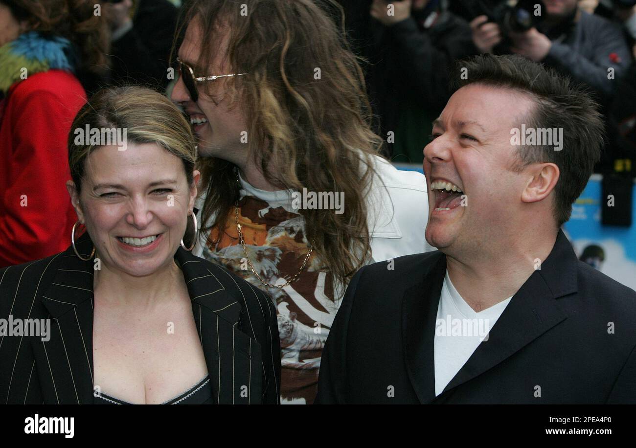 British comedy actor Ricky Gervais with his wife Jane laugh at a