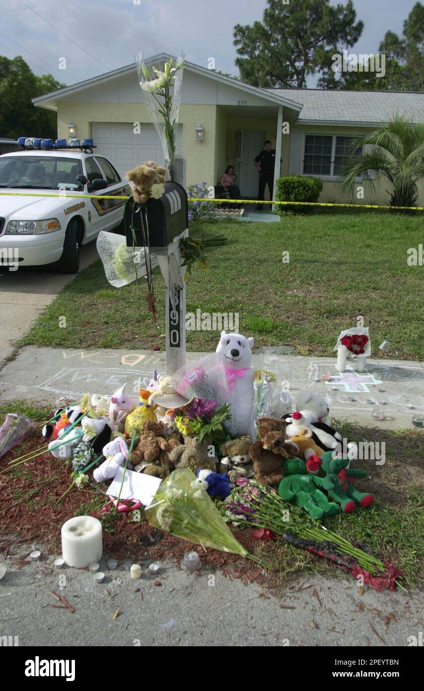 Longwood police and crime scene investigators remain at a home in