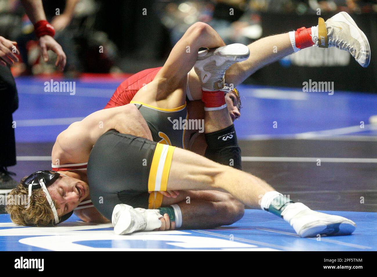 Pittsburgh's Micky Phillippi and Oklahoma's Wyatt Henson scramble for a
