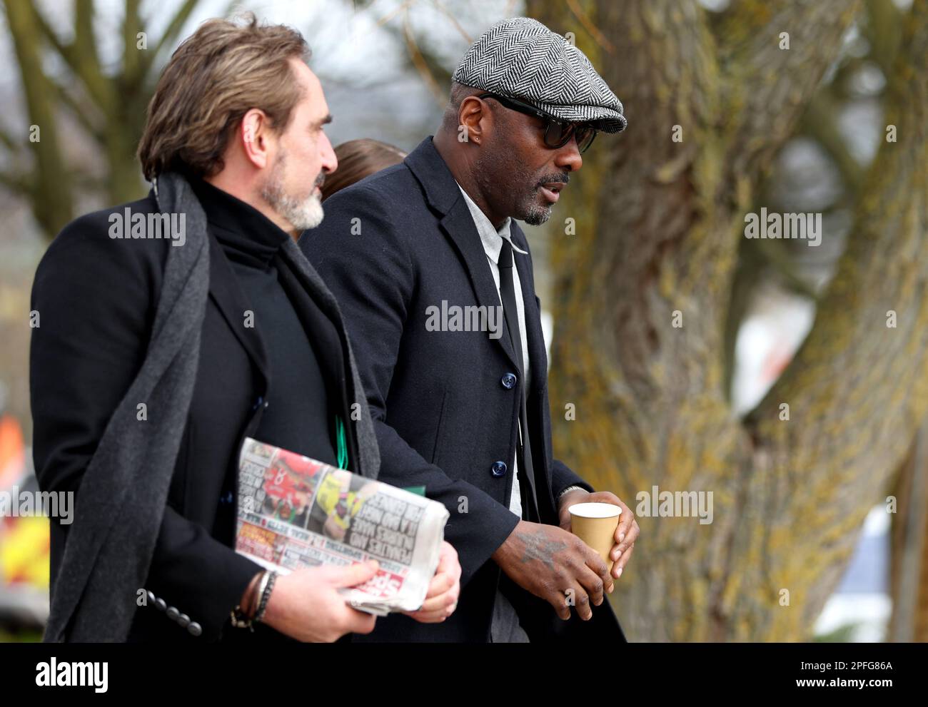 Idris Elba et Julian Dunkerton arrivent avant le quatrième jour du Cheltenham Festival à l'hippodrome de Cheltenham. Date de la photo: Vendredi 17 mars 2023. Banque D'Images