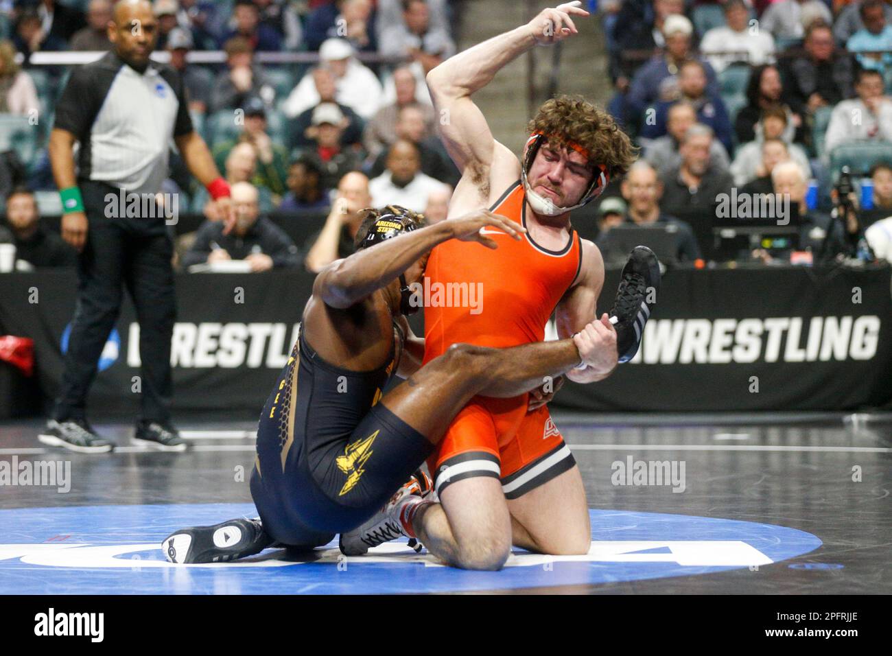 Oklahoma State's Daton Fix scrambles with Arizona State's Michael McGee