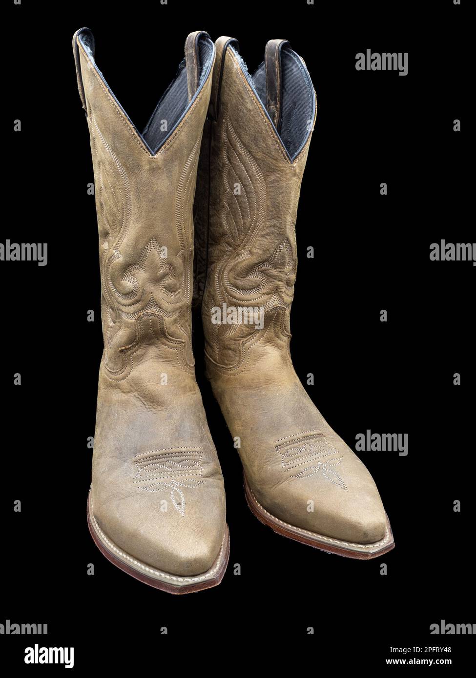 Les bottes classiques en similicuir de l'Ouest sont toujours un accessoire idéal pour toutes les tenues. Banque D'Images
