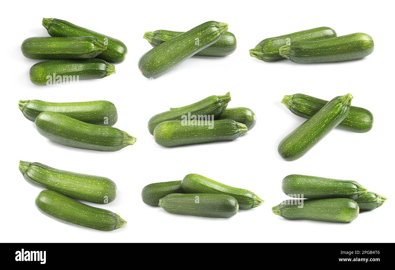 Ensemble de courgettes fraîches mûres sur fond blanc Banque D'Images