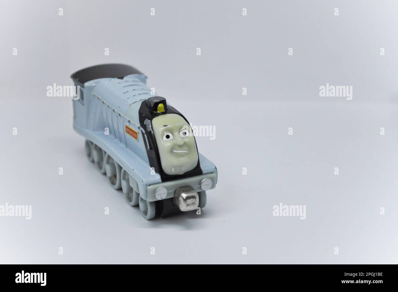 Un modèle coulé sous pression de Spencer de la série Thomas the Tank Engine sur fond blanc Banque D'Images