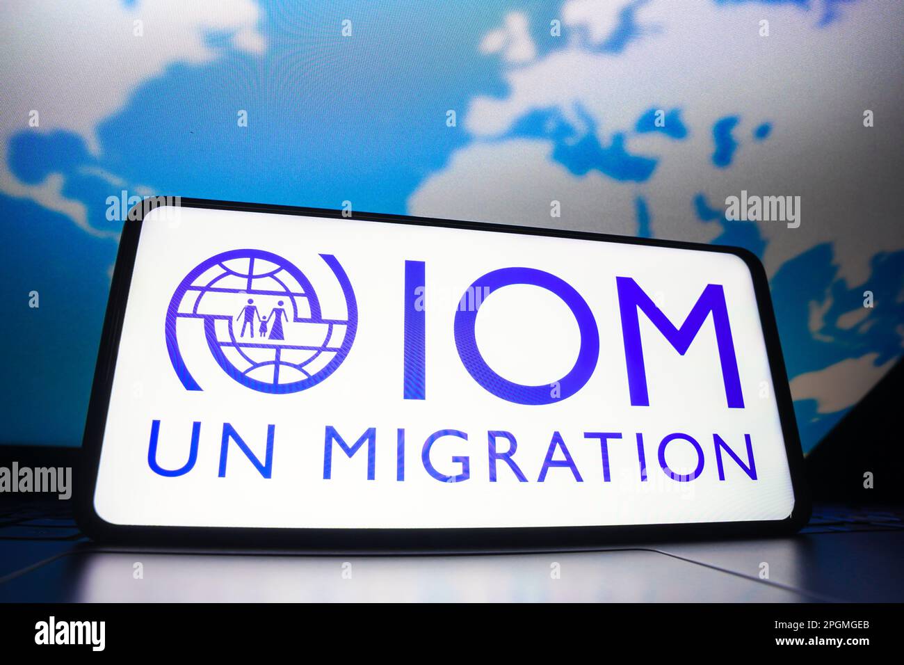Sur cette photo, le logo de internationale pour la migration (OIM) s'affiche sur Sur cette photo, le logo de internationale pour la migration (OIM) s'affiche sur