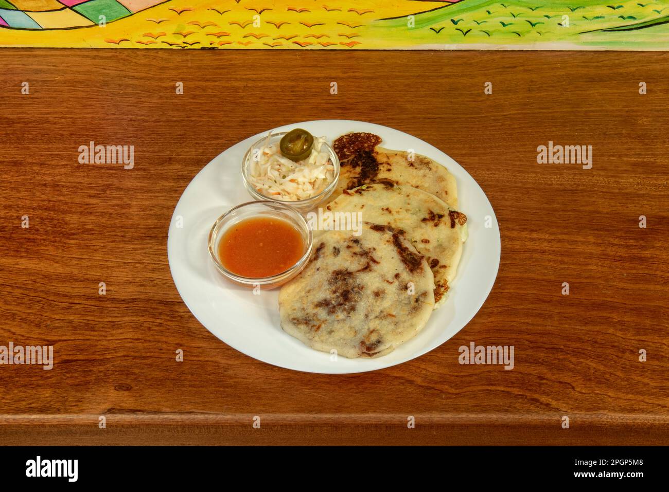 Dans la région de Paisa, l'arepa accompagne chaque repas de la journée et un collier d'arepa est décerné pour honorer les personnes célèbres Banque D'Images