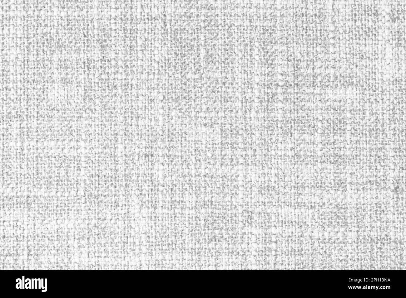 Texture gros plan de tissu ou de tissu blanc naturel à tissage grossier. Texture de tissu de coton naturel ou de tissu de lin. Arrière-plan de toile blanche. D Banque D'Images