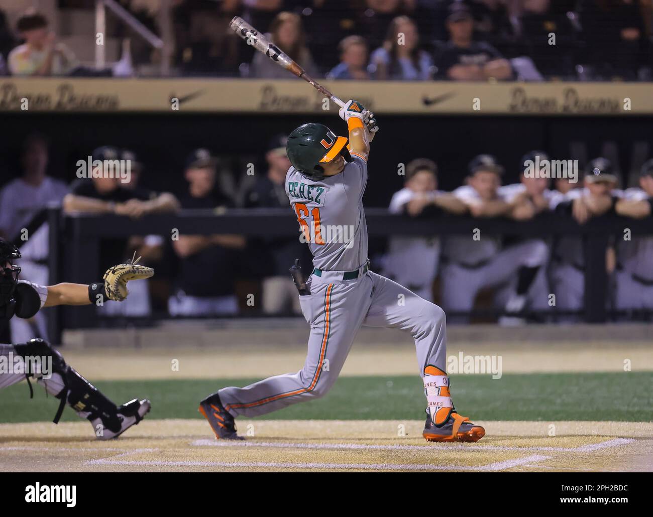 24 mars 2023: Le jeune Carlos Perez (61) de l'Université de Miami frappe le ballon. Wake Forest a gagné 11-0 contre.University of Miami. Match de baseball NCAA entre l'Université de Miami et l'Université Wake Forest à David F. Couch Ballpark, Winston Salem. Caroline du Nord.David Beach/CSM Banque D'Images