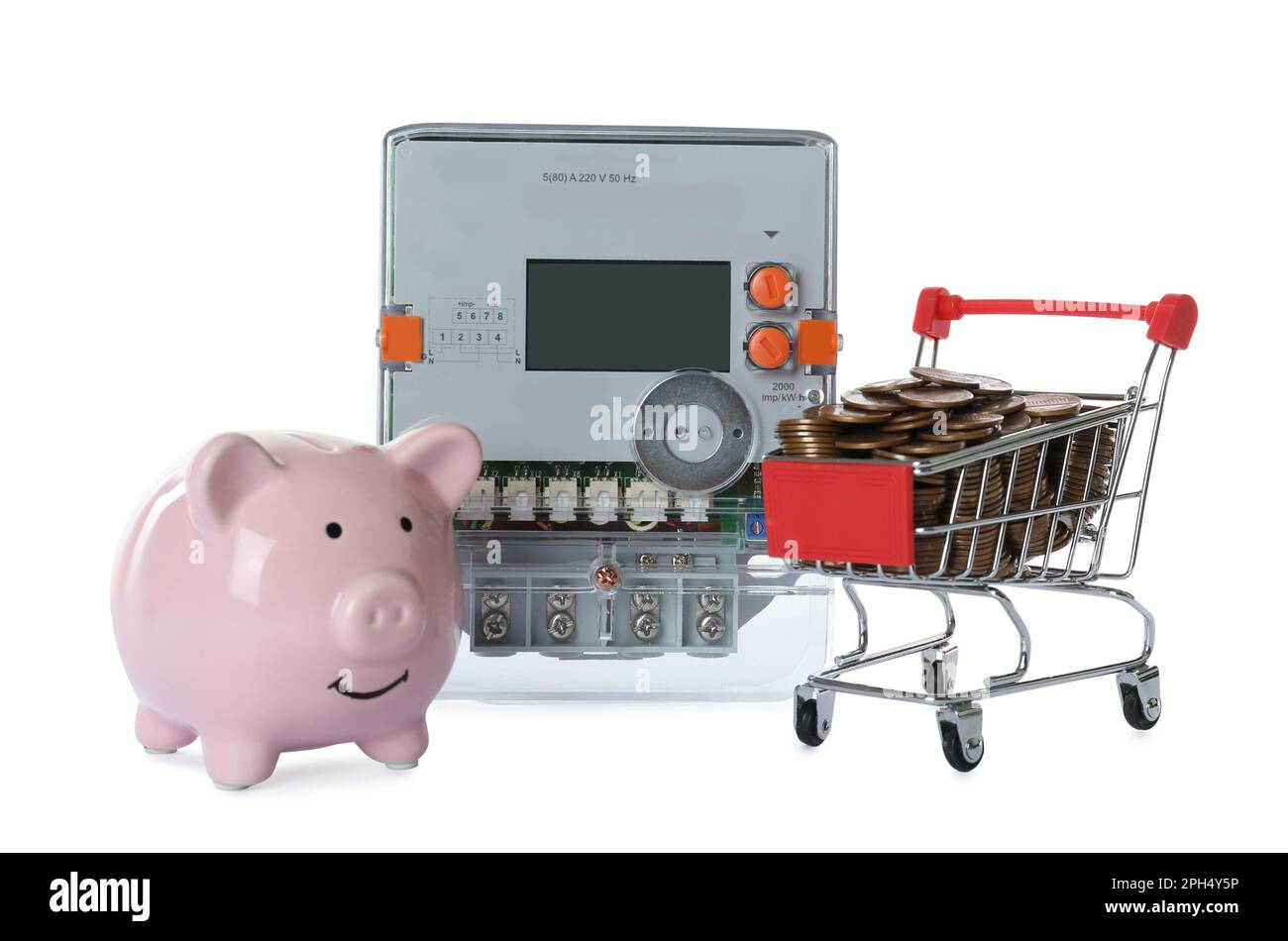 Compteur d'électricité, banque de porc rose et petit panier avec pièces de monnaie sur fond blanc Banque D'Images