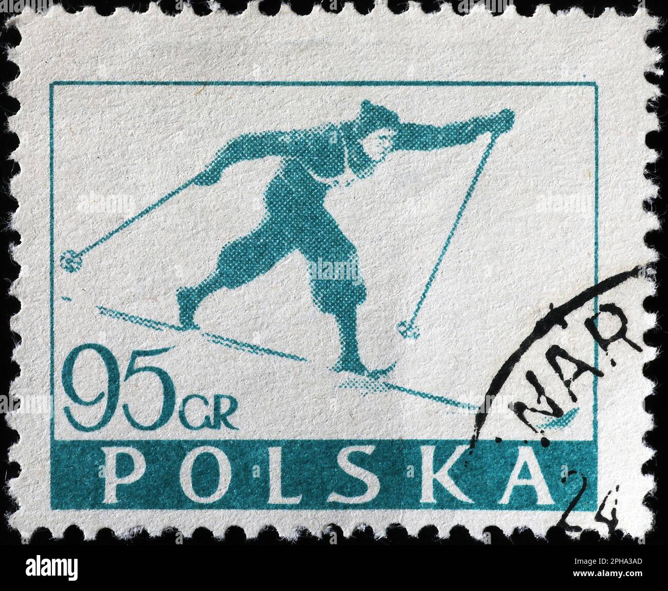 Ski de fond sur un ancien timbre-poste à polir Banque D'Images