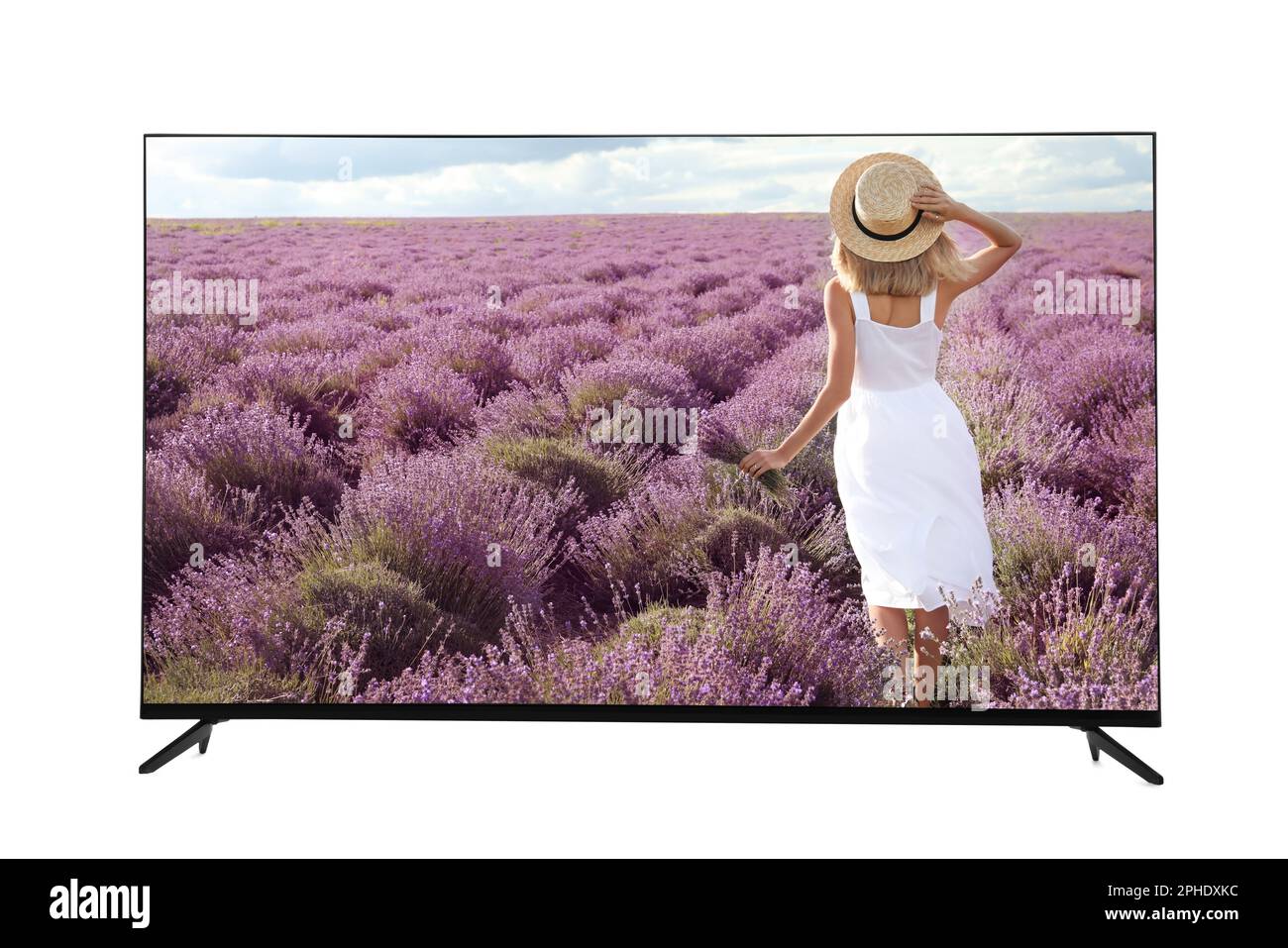 Moniteur TV moderne à écran large montrant une femme avec bouquet dans le champ de lavande isolé sur blanc Banque D'Images