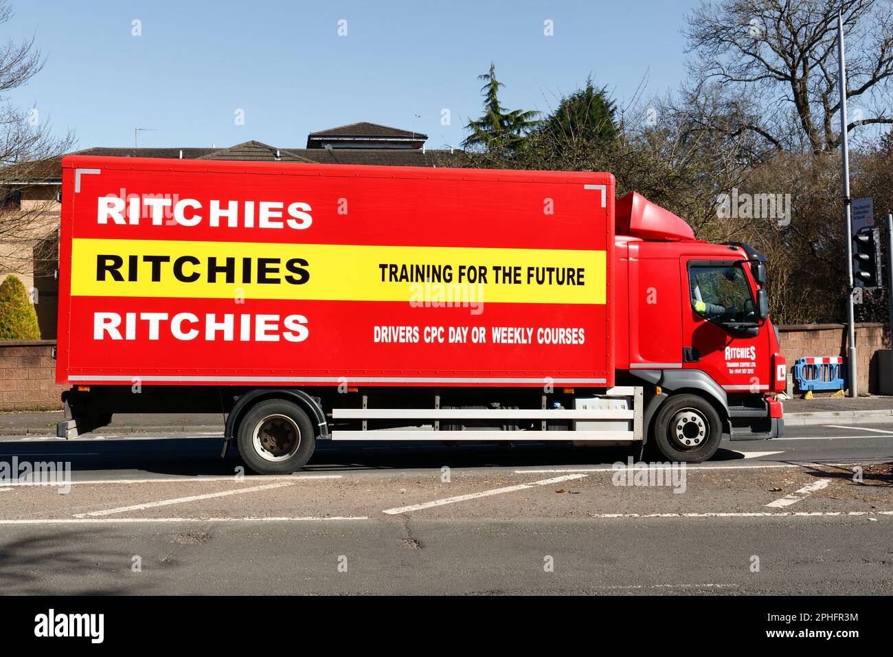 Un conducteur apprenant dans un camion Ritchies, en Écosse, au Royaume-Uni, en Europe Banque D'Images