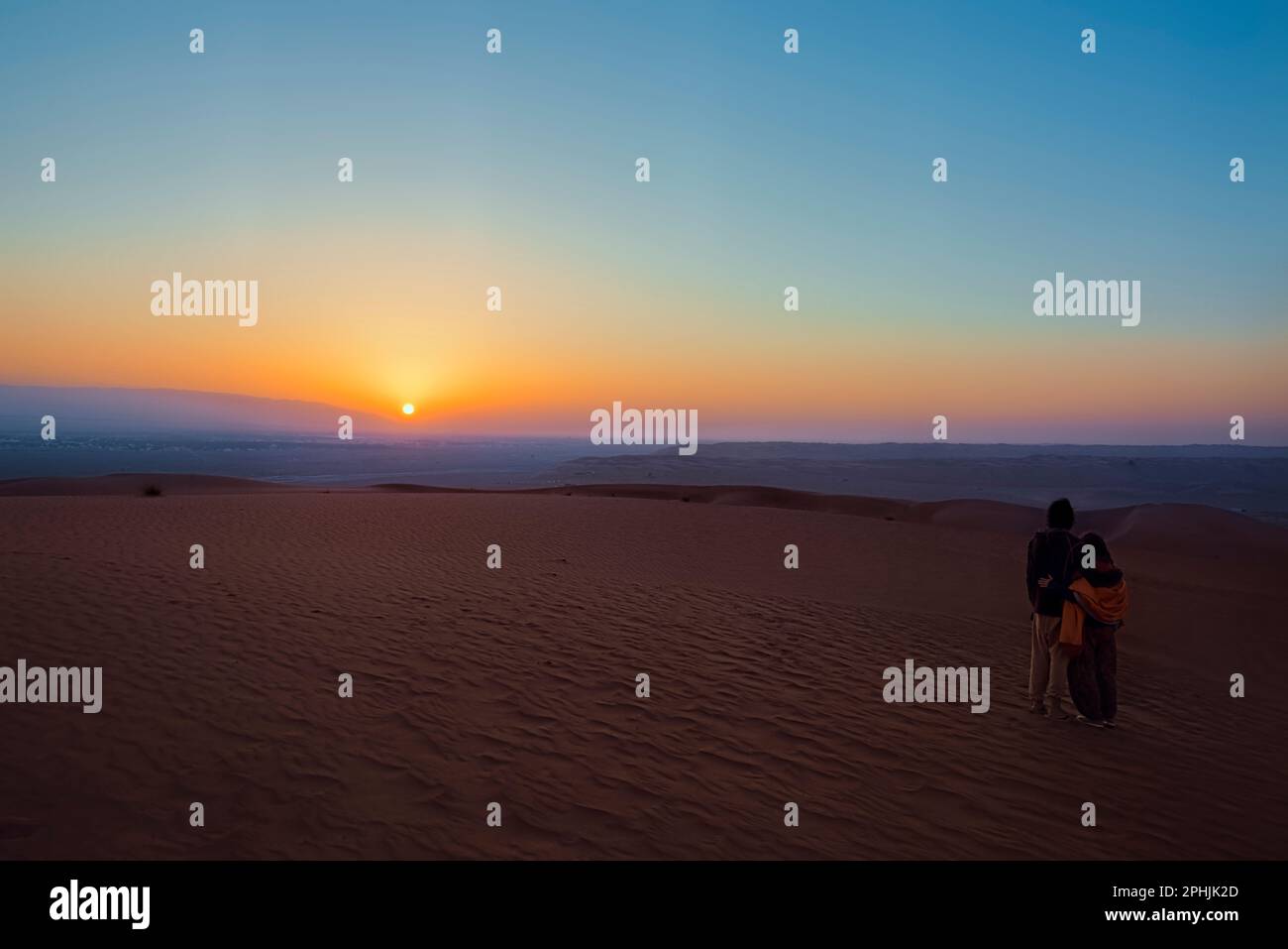 Profitez du lever du soleil dans les sables Wahiba, Oman Banque D'Images