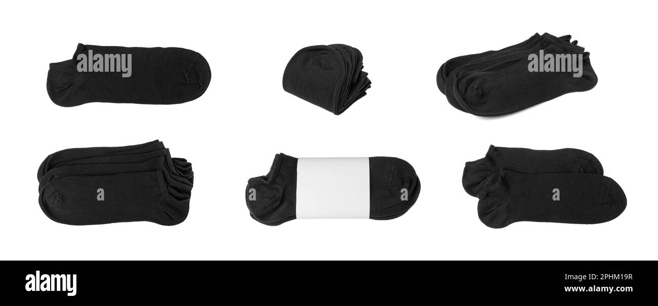 Nouveau chausson isolé en coton noir. Vêtements de sport pliés, chaussettes en coton Unisex classiques, bonneterie décontracté sur fond blanc vue du dessus Banque D'Images