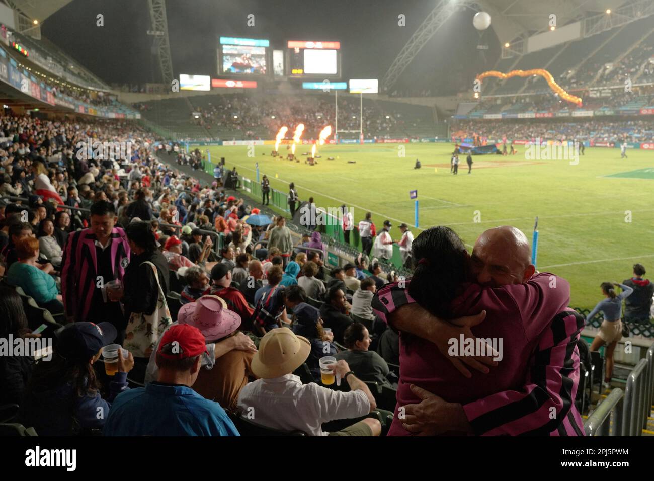 Fans attend the opening ceremony on the first day of the Hong Kong Sevens rugby tournament in Hong Kong, Friday, March 31, 2023. (AP Photo/Anthony Kwan) Banque D'Images
