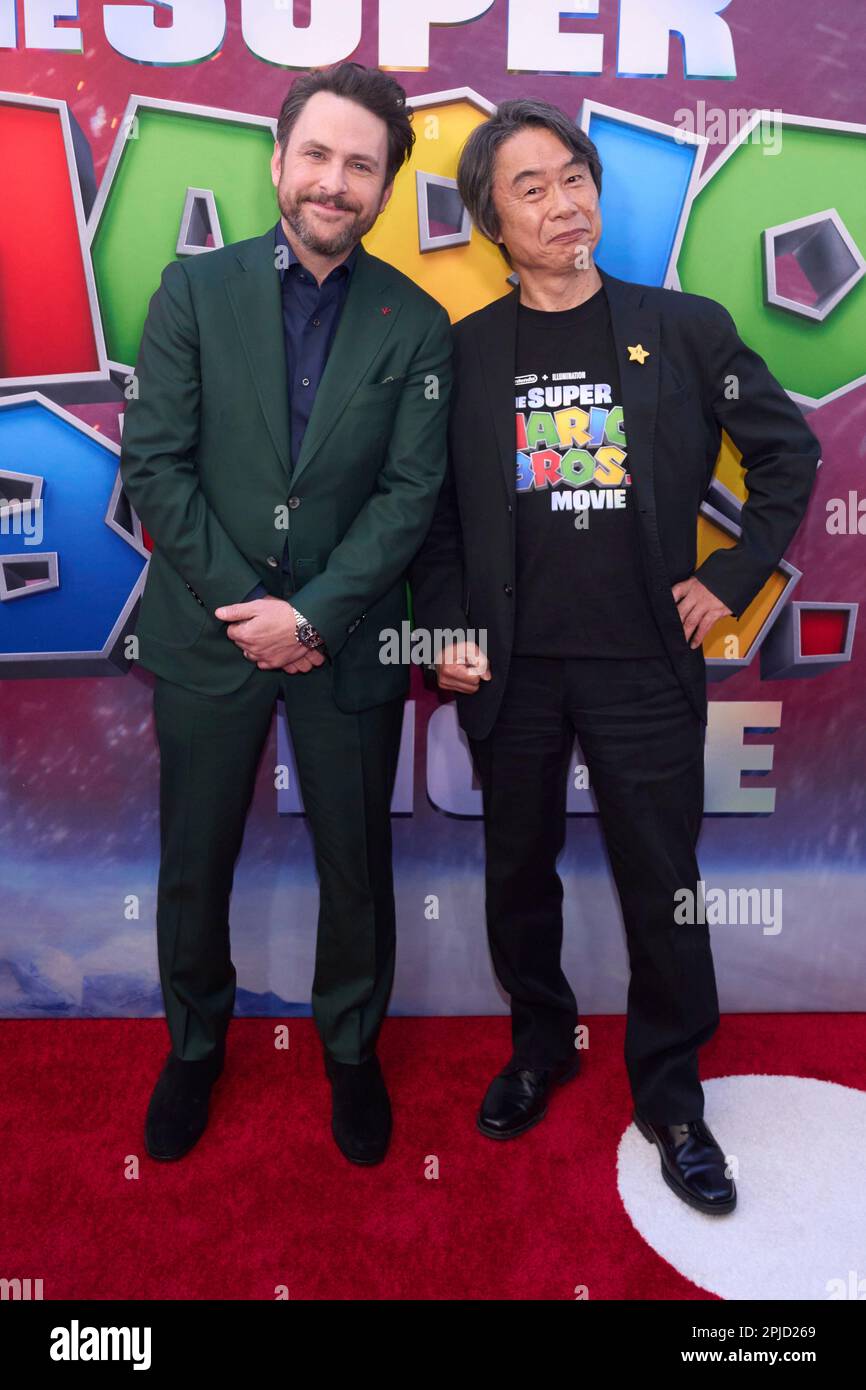 Shigeru Miyamoto, left, and Charlie Day arrive at the premiere of "The Super Mario Bros. Movie" Saturday, April 1, 2023, at Regal LA Live in Los Angeles. (Photo by Allison Dinner/Invision/AP) Banque D'Images