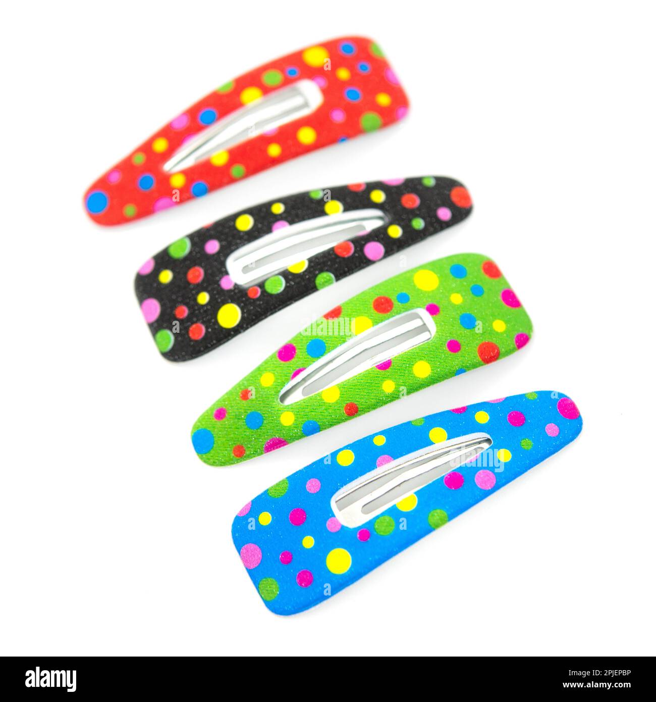 Serre-cheveux colorés isolés sur fond blanc. Banque D'Images