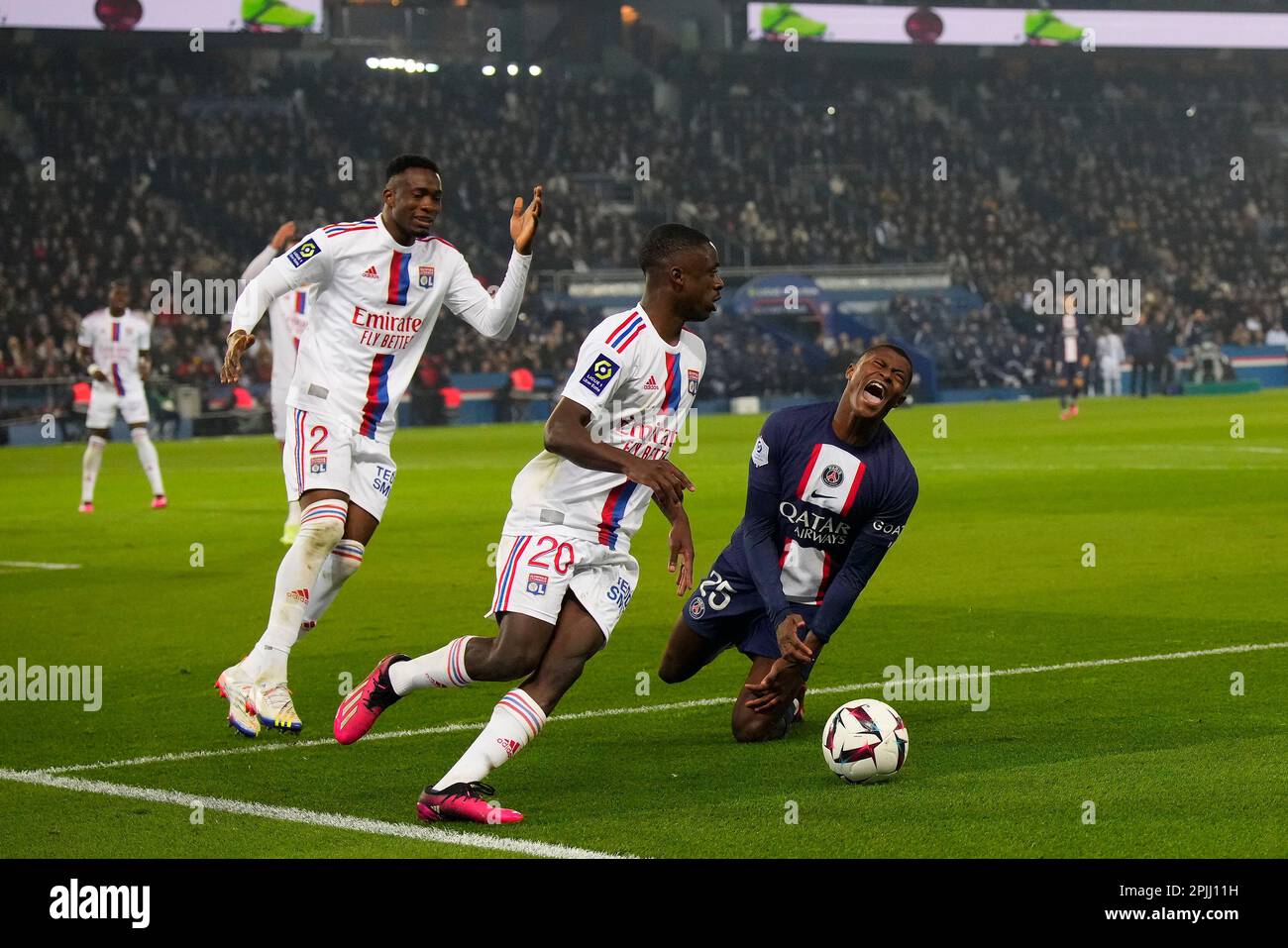 Paris, France. 2nd avril 2023. Le Nuno Mendez (1st R) de Paris Saint Germain réagit lors d'un match de football de la Ligue française 1 entre Paris Saint Germain (PSG) et le Lyonnais olympique (OL) à Paris, France, 2 avril 2023. Credit: Glenn Gervot/Xinhua/Alay Live News Banque D'Images
