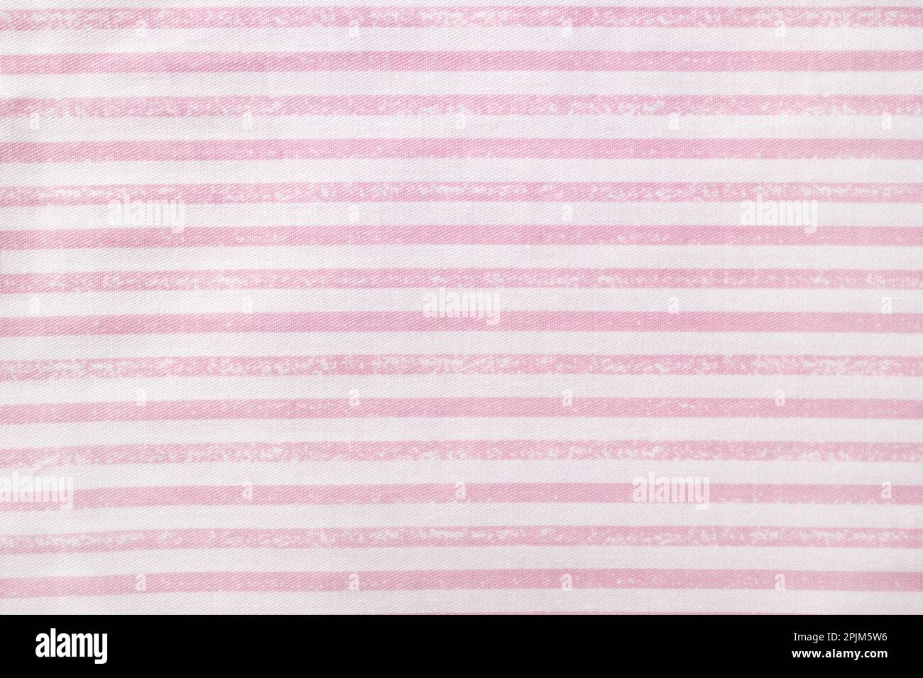 Texture en coton à rayures roses et blanches. Toile de fond textile Banque D'Images