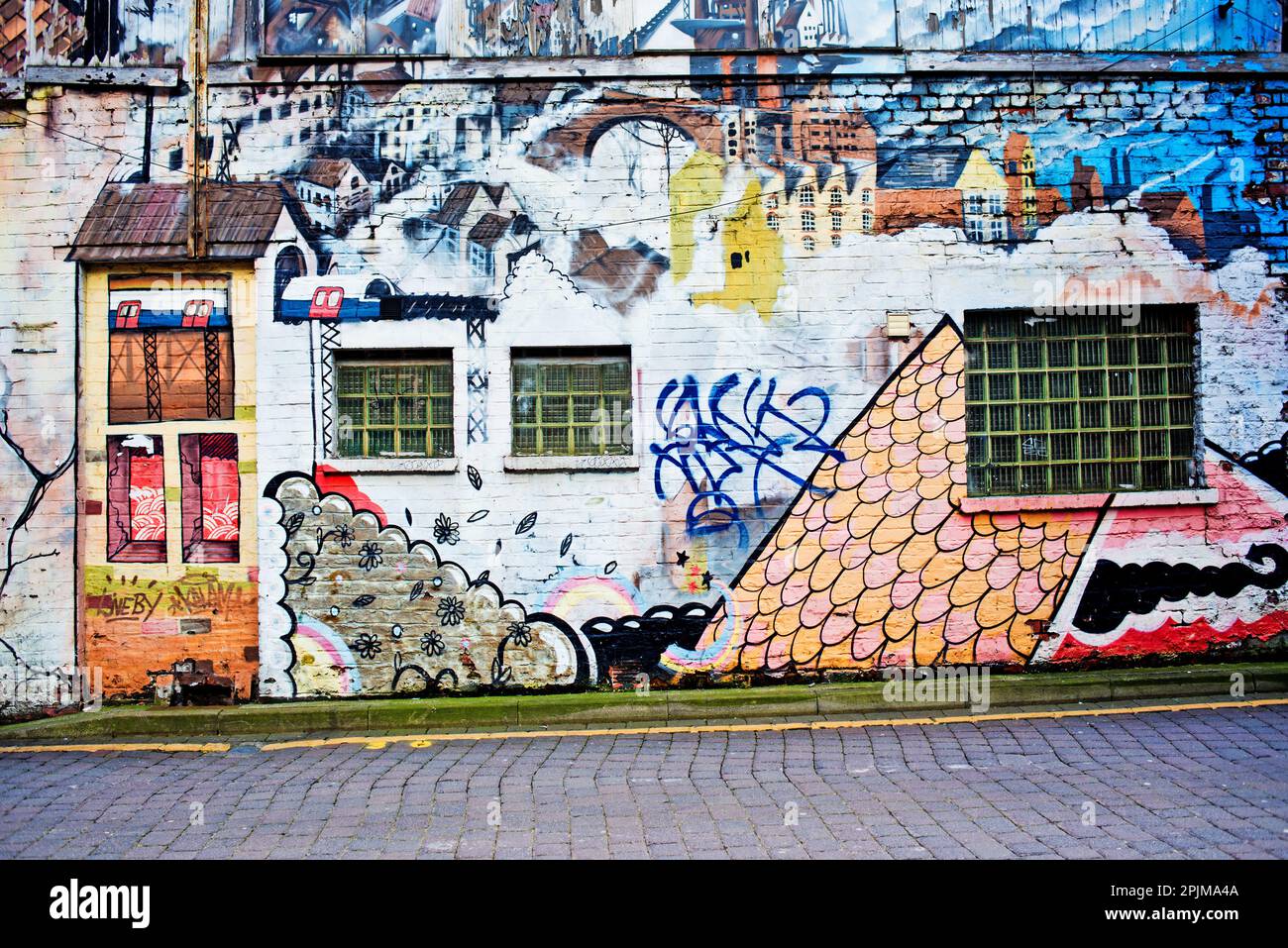 Street Art on Railway Arch, Oxford Road Railway Station, Manchester, Lancashire, Angleterre Banque D'Images