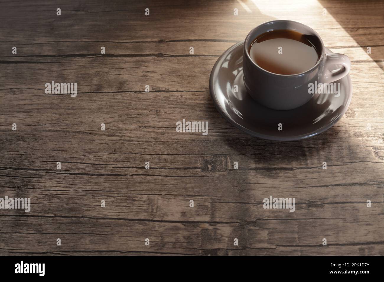 Tasse de café du matin sur table en bois, espace pour le texte Banque D'Images