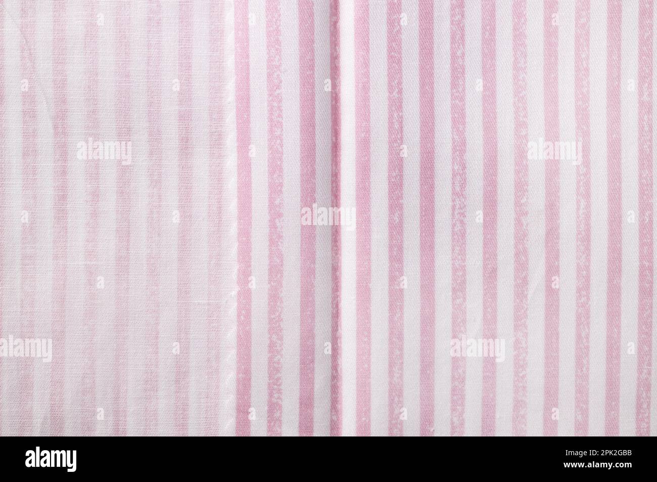Texture en coton à rayures roses et blanches. Toile de fond textile Banque D'Images