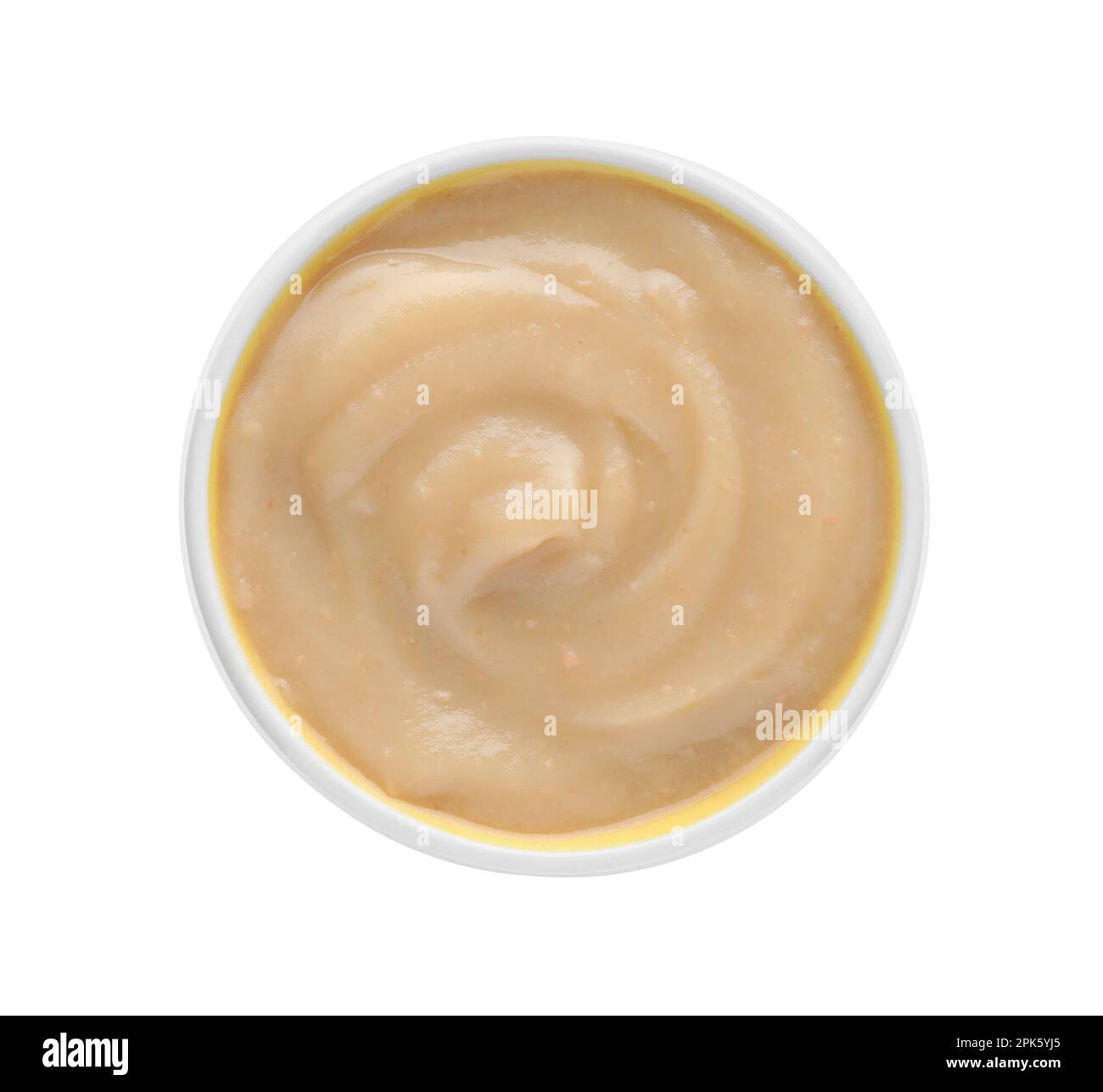 Purée de fruits dans un bol sur fond blanc, vue du dessus Banque D'Images