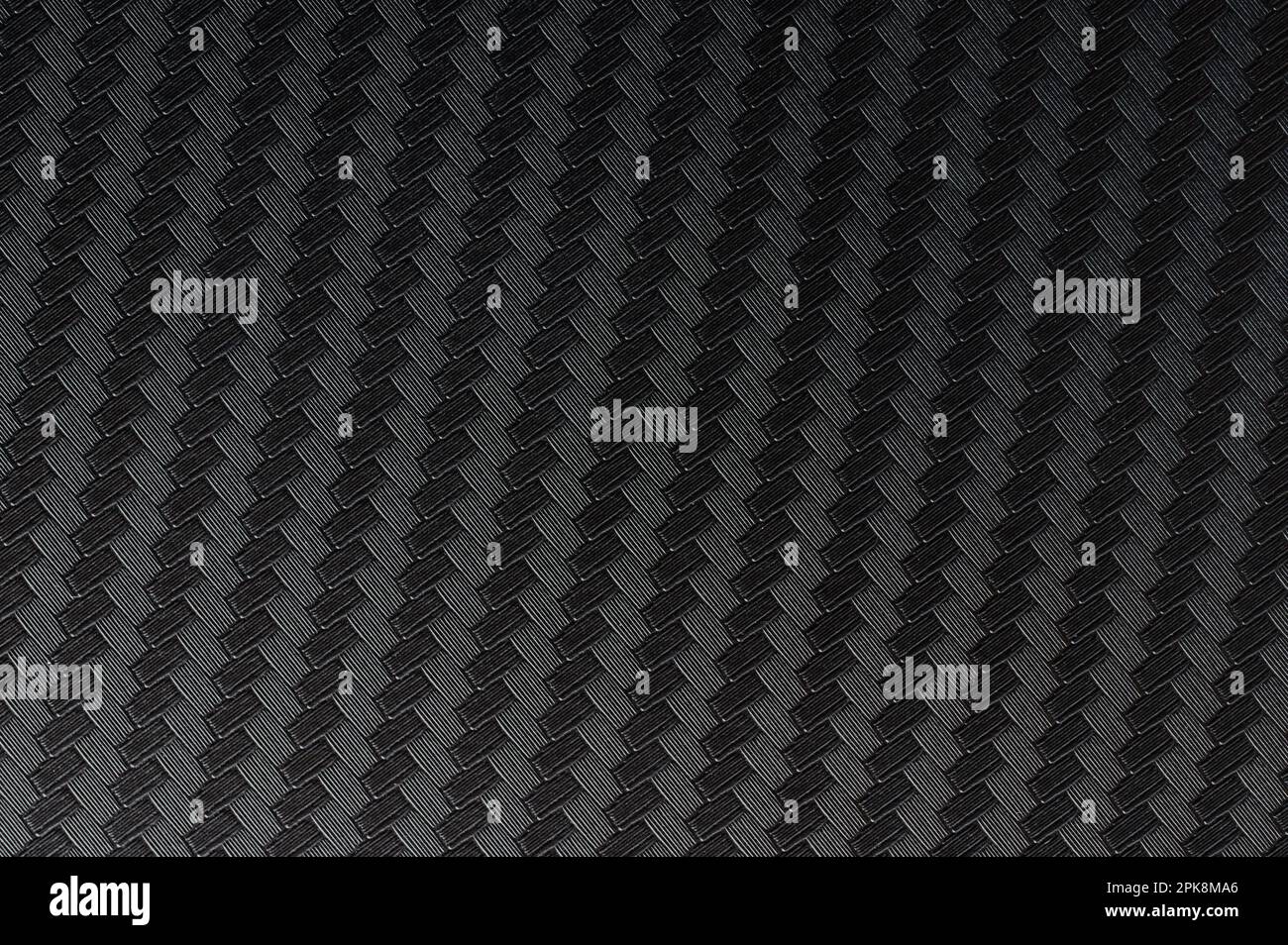 Motif bloc en fibre de carbone fond transparent macro gros plan vue à plat Banque D'Images