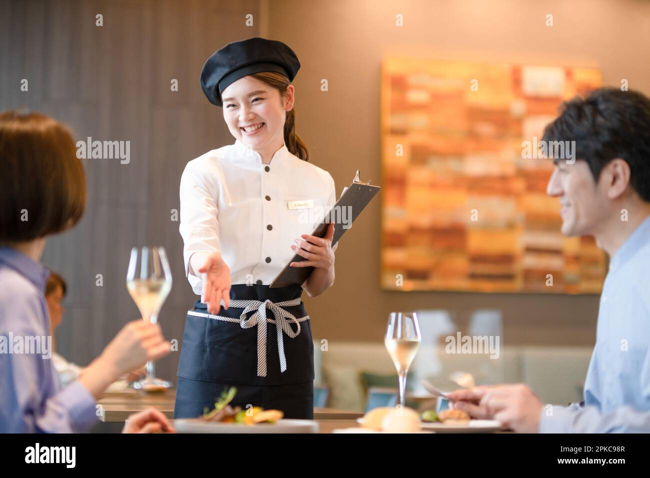 Conversation avec une serveuse Banque D'Images