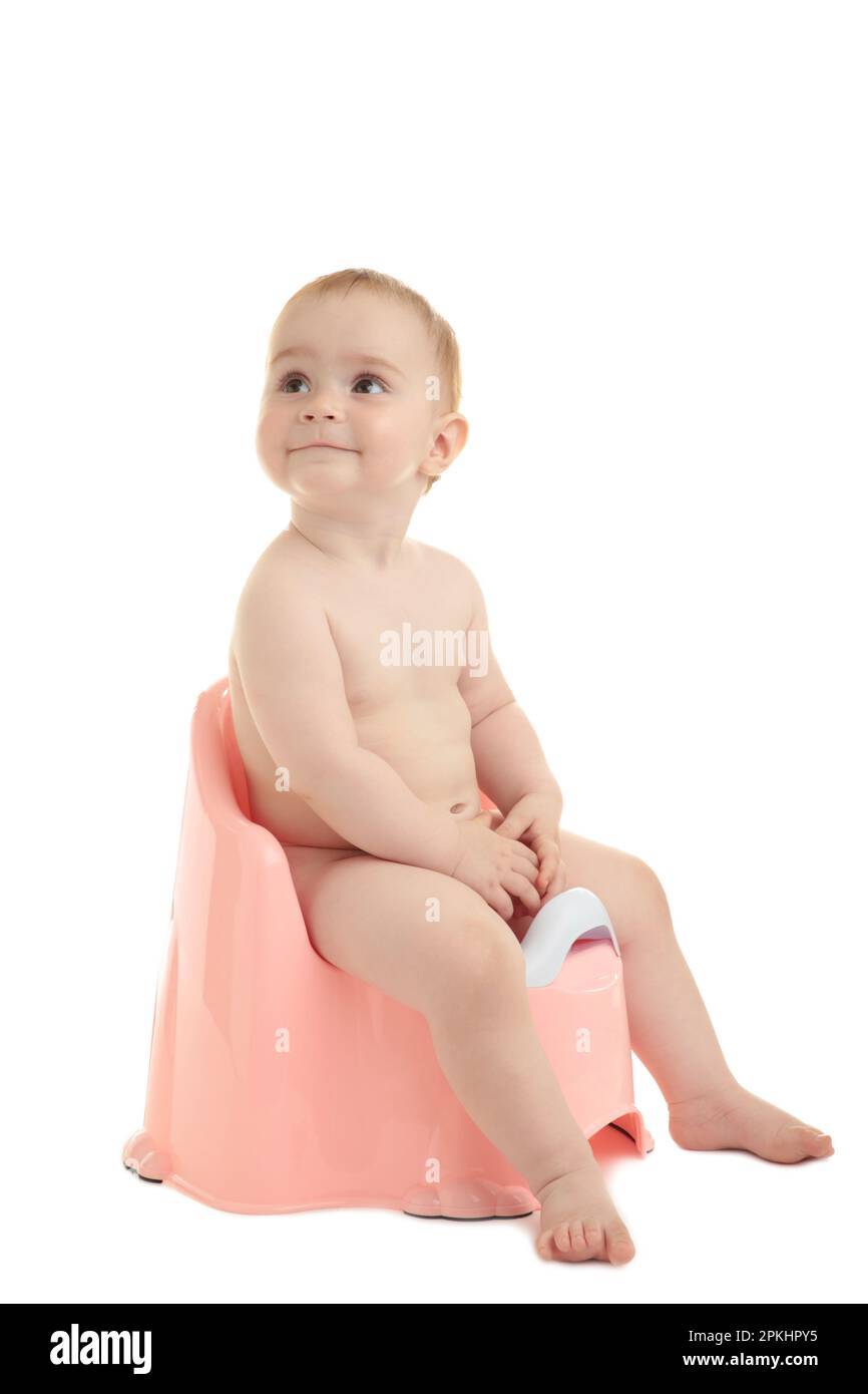 Bébé souriant sur un pot isolé sur fond blanc. Vue de dessus Banque D'Images