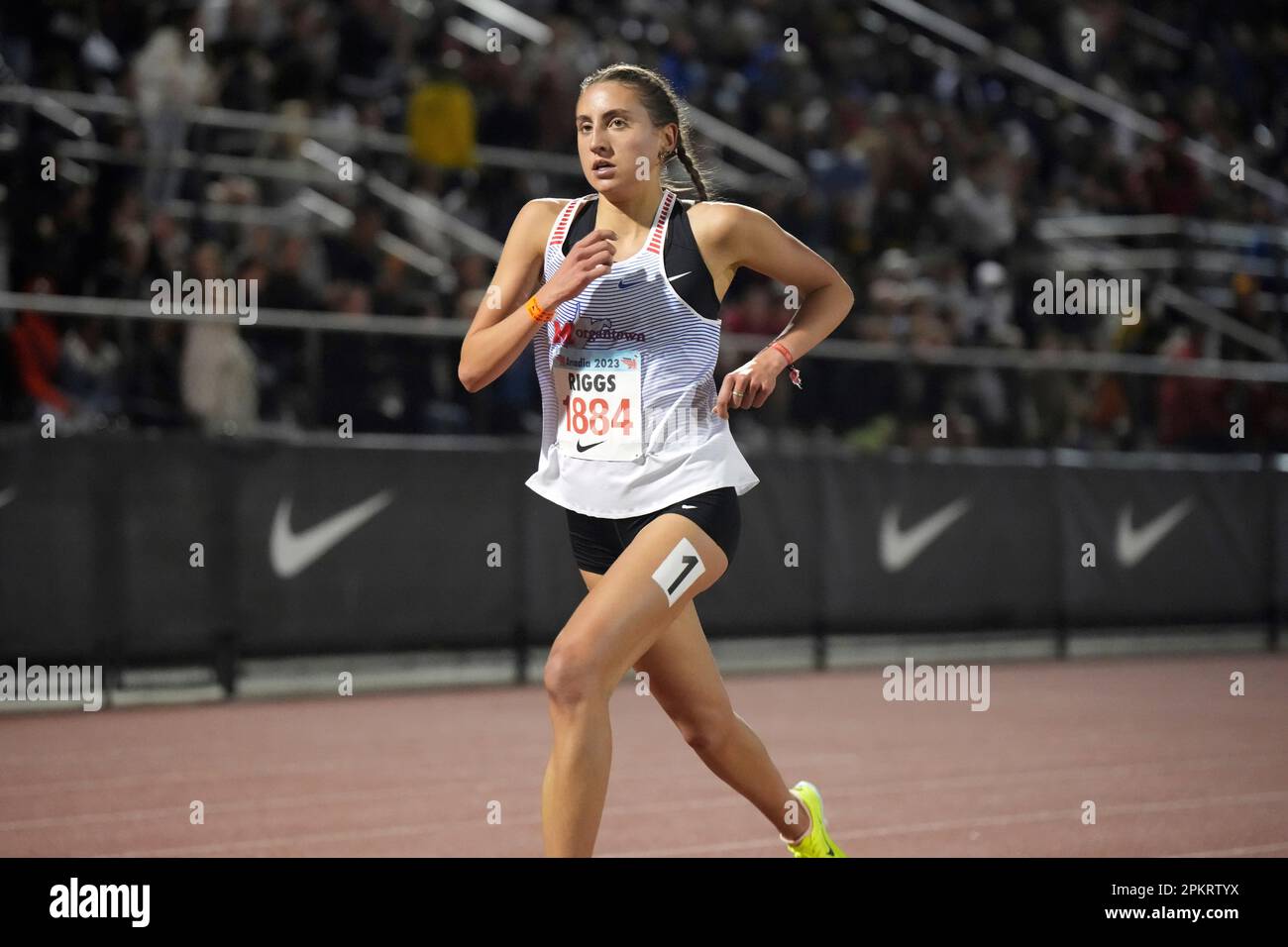 Irene Riggs of (WV) wins the girls' invitational 3,200m in 9