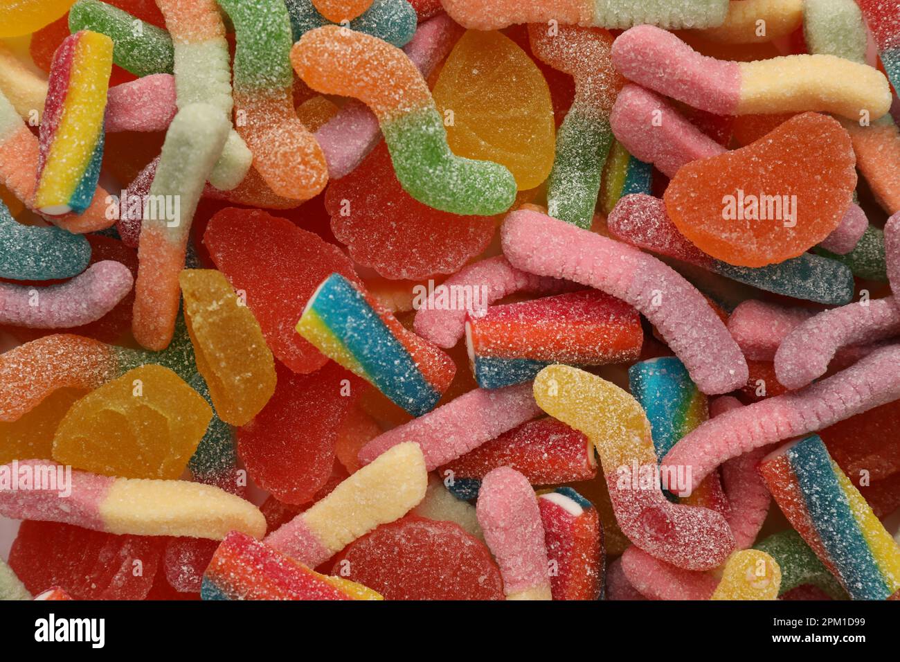 Beaucoup de différentes bonbons en gelée savoureuses comme arrière-plan, vue de dessus Banque D'Images