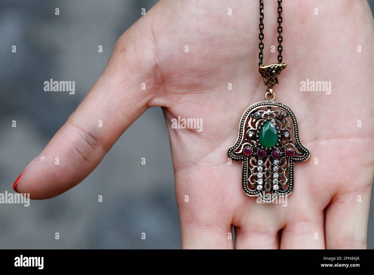 Gros plan d'un amulette de hamsa musulman, également connu de la main de fatima ou de la main de Marie. Banque D'Images